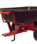 Rock Solid Six Hundred Fifty Pound Poly Dump Cart For Tough Job Site Hauling with pneumatic tires and spring hitch.