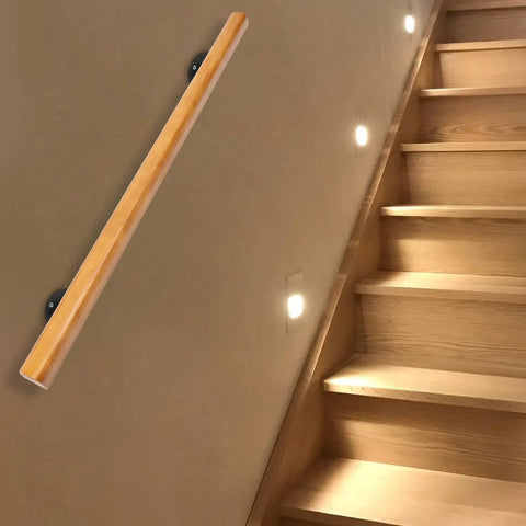 Rock Solid Pine Wood Stair Handrail With Legit Heavy Duty Metal Brackets And Smooth Rounded Corners on indoor staircase.