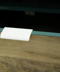 Six Pack White Arc Surface Drawer Pulls For Furniture Cabinets Edge Mount Hidden Cabinet Handles installed on wood drawer