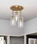Ophelia 3 Light Semi Flush Ceiling Fixture in gold brass with clear glass shades for hallways dining rooms and bedrooms modern farmhouse style