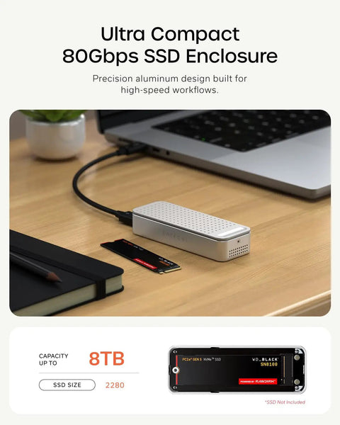 Rad Speed 80Gbps NVMe SSD Enclosure With Direct Hook Up USB4 V2 Connector and active cooling on a workspace with a laptop.