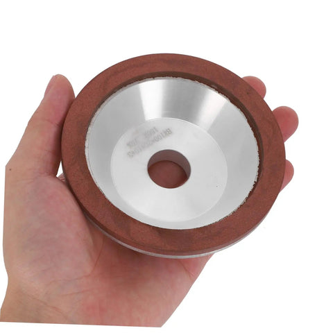 Diamond Concave Cup Grinding Wheel for Sharp Metal And Carbide Tasks Super Versatile Silvertone in hand showing silver resin design.