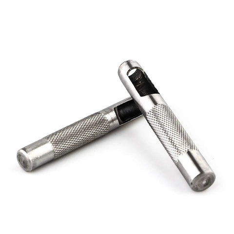 Two metal pieces from 9 Piece Leather Hole Punch Set Hollow Round Punches 3/32 To 25/64 Inch Heavy Duty Carbon Steel.
