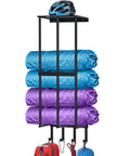 Front view of Matte Black No Fuss Wall Mount Camping Chair Storage Rack With Floating Shelf And Four Hooks For Garage Organization.