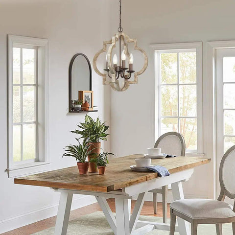 Dining room with Handmade Wood Farmhouse Orb Chandelier With Four Lights, Openwork Quatrefoil Frame, Distressed Brown Wood And Bronze Rust Arms.
