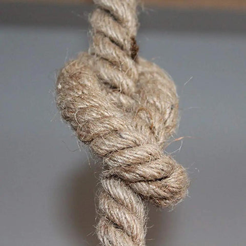 Close-up of natural rope from Coastal Rope Rattan Handwoven Pendant Lamp In Natural Finish, Boho Chic style.