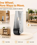Heavy Duty Vertical Track Roller Wheels For Sliding Doors Featuring Silky Smooth Glide Rubber Casters As Bottom Guides To Fix Sticking Tracks And Level Up Your Closet Setup Without The Hassle Four Pack, shown with wooden door and plant stand.