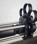 Pro-Grade 1 Inch Coaxial Filter Wheel With Cage Type Mount attached to telescope rods, M4/M6 mounting, black.