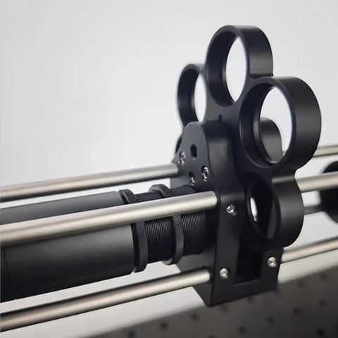 Pro-Grade 1 Inch Coaxial Filter Wheel With Cage Type Mount attached to telescope rods, M4/M6 mounting, black.