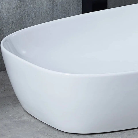 Close-up of 28x15 Inch Oval Porcelain Vessel Sink White Ceramic Above Counter Bathroom Basin for Vanity Cabinet