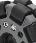 Close-up of 100mm double plastic omnidirectional wheel with nylon body, featuring rubber rollers for smooth robotics movement.