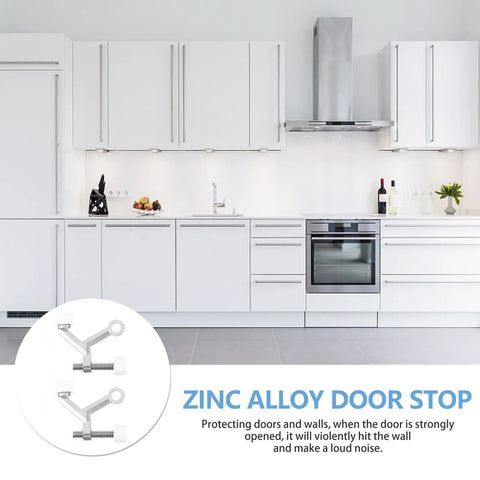 Zinc Alloy Door Stopper Buffer displayed in a modern white kitchen, showcasing its function as a silver door protector and holder.