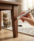 Using a touch-up marker on a scratched wooden table leg in a cozy living room. Complete 21 Piece Wood Scratch Repair Kit With Ten Color Touch Up Markers And Wax Filler Sticks For A No Sweat Quick Fix On Hardwood Floors Cabinets Desks Or Bedposts Today.