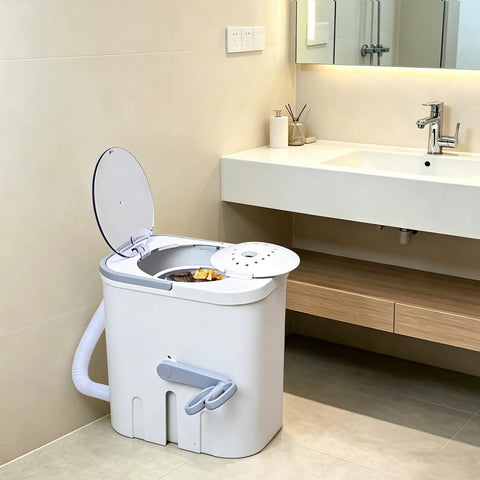 Hand Cranked Portable Washing Machine For Off Grid Camping And Rv Life Non Electric Manual Laundry Scrubber in a modern bathroom.