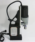 Heavy Duty 110V Magnetic Drill Press Working As A True Workhorse With A Rock Solid Electro Mag Base For Zero Hassle Metal Annular Cutting Up To 40 Millimeters shown side view featuring robust construction and power cord.