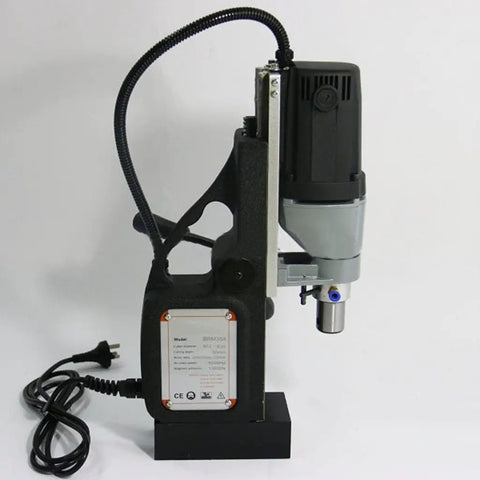Heavy Duty 110V Magnetic Drill Press Working As A True Workhorse With A Rock Solid Electro Mag Base For Zero Hassle Metal Annular Cutting Up To 40 Millimeters shown side view featuring robust construction and power cord.