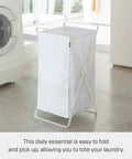 Foldable Laundry Basket With Steel Frame And Polyester Bag Portable Hamper Organizer For Home Collapsible Laundry Tote In White No Sweat Easy Carry For Laundry Day And Quick Storage in a laundry room setting