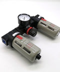 Three Unit Air Source Treatment FRL Combo For Pneumatic Systems with filter, regulator, and lubricator, black and beige units, top view