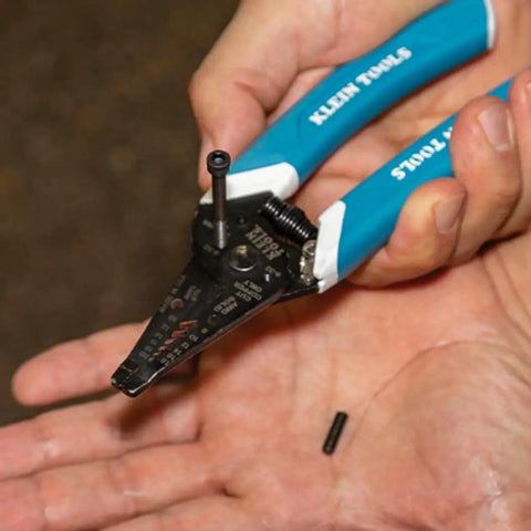 Pro Grade Wire Stripper And Cutter For 8 To 18 AWG Solid And 10 To 20 AWG Stranded Wire with precision stripping holes in hand
