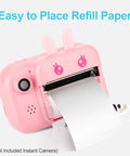 10 Roll Print Paper Refill For Kids Instant Camera That Fits Most Mini Photo Cameras, 4 x 2.2 Inch Thermal Paper, Each Roll Delivers About 60 Photos, Quick Easy Install, Great For On The Go Fun. Pink kids instant camera with thermal paper roll loading