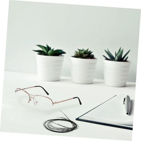 Replaceable Eyeglass Repair Thread for Quick Eyewear Adjustments, Lightweight Fixing String Kit on desk with notebook