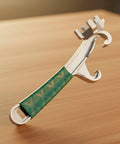 Heavy Duty Tough As Nails Multi Function Paint Pail Opener Alloy Drum Wrench with green non-slip handle.
