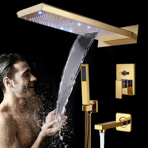 UMJIGF Luxury Led Shower System Gold Waterfall Shower Faucet Set Multifunction Brass Shower Combo Set in use with water flowing.