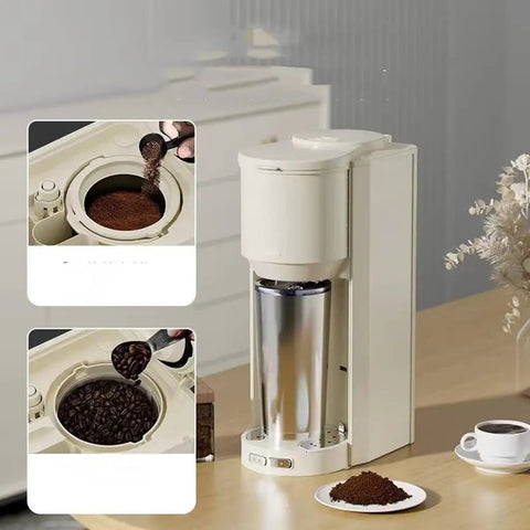 Automatic Coffee Maker With Built In Grinder Compact Portable Insulated Cup on a kitchen table, showing coffee beans and grounds.