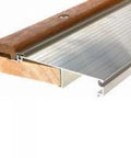 Close-up of TAOC36A Adjustable Aluminum And Oak Sill Threshold For Doors, 3 Ft Long, showing mill finish and weatherproof design.