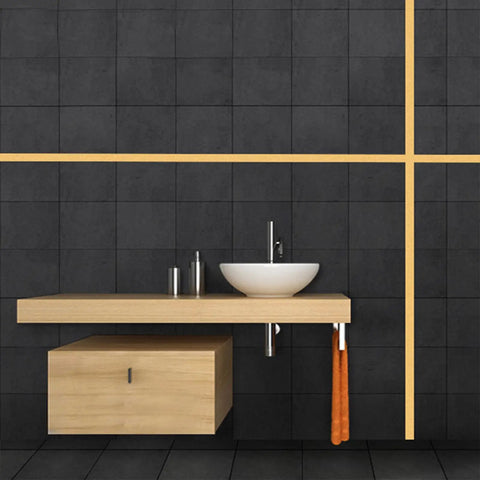 Bathroom with black tiles featuring Molding And Wall Trim With Gold Metalized Mirror Like Finish, Peel And Stick Stainless Steel Self Adhesive Molding Strip, 16.4 Ft Long By 0.8 In Wide, DIY Decor Upgrade For Walls, Cabinets And Floors horizontally and vertically.