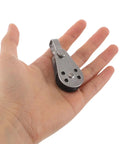 Beefy Stainless Steel Rope Pulley Block Set 4 Pack Heavy Duty Swivel Pulley shown in hand for size comparison