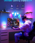 Lit RGB Hexagon LED Panel Lights for Wall with Smart App Control in a gaming room setup, seven panels illuminating a desk area