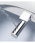 Close-up of water spray mechanism from Top Shelf Smart Toilet Seat Kickin Instant Warmth With Seamless Auto Flip Cover.
