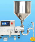 Heavy Duty Stainless Steel Paste Filling Machine With Wide Mouth Hopper For No Sweat Bottle Filling At 40 Liters Per Minute showing honey pouring out.