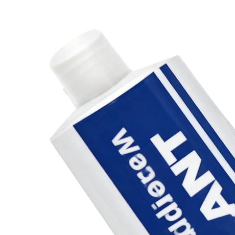 Heavy Duty Waterproof Roof Sealant And Instant Bonding Glue Stops Leaks Cold And Seals Joints Tight On Any Exterior Surface Quick Set Formula With Serious Grip To Handle The Heat tube with white cap close-up