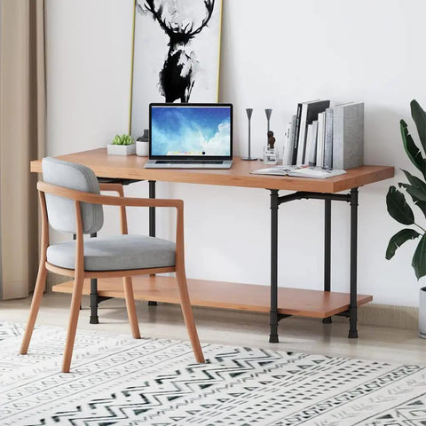 Beefy Industrial Pipe Desk Leg Set 28 Inch Heavy Duty Vintage Style Furniture Legs supporting wooden desk with laptop and books.
