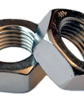 Top Shelf Stainless Steel Jam Nuts Pack Of Fifty 3 8 16 Thread Heavy Duty Hex Fasteners for Marine Auto and Gearhead Projects. Two jam nuts.