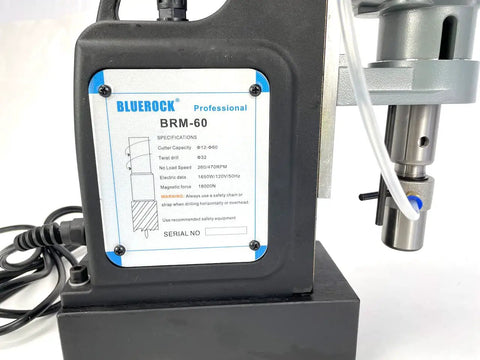 Black 60mm Magnetic Drill With Rock Solid 52 Lb Base Two Speed Reversible Motor Heavy Duty Steel Working Beast Built Tough For Tough Jobs Includes Mt3 Arbor And Quick Change Adapters Straight Shooting Power Delivery close-up of the control panel and specifications.
