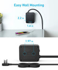 Total Game Changer 11 In 1 Power Strip With Eight Ac Outlets And Rapid Usb C Charging To Keep Every Gadget Running Smoothly Plus Two Usb A Pockets Five Foot Extension Cord And Heavy Duty Surge Guard mounted on wall with charging phone