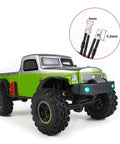 Lit RC Light Strips Kit For 1/24 Scale Crawler SCX24 Series mounted on green RC truck with LED headlights
