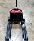 Heavy Duty 24 Volt Electric Pallet Jack With Lithium Battery That Crushes It Holding Up To 3,300 Lbs front view with reinforced steel forks.