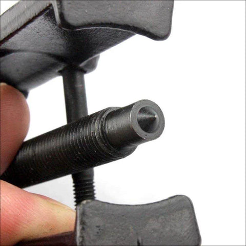 Close-up of Two Jaw Twin Leg Gear Puller Bearing Removal Tool Kit With Screw Lock And Adjustable Arms For 17-38mm Bearings.