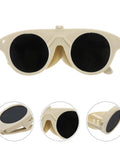 High Grade Welding Goggles And Safety Glasses Featuring Adjustable Impact Resistant Lenses For Gas Arc Cutting Grinding Hardcore Shop Job Crew Approved Must Have Gear with beige plastic and dark lenses.