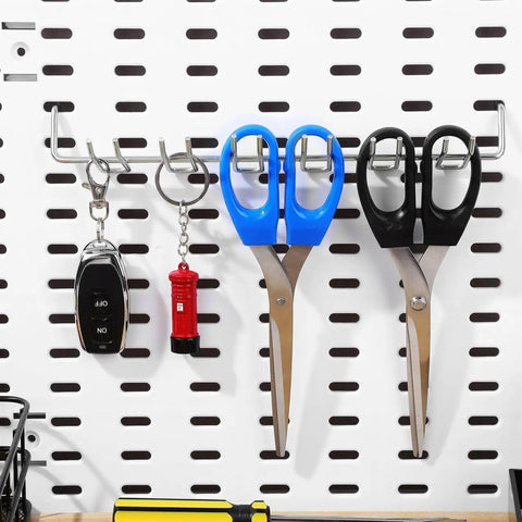 Two Pack Multi Prong Pegboard Accessories Organizer Kit With Tool Storage Hooks holding scissors and keys on white pegboard.