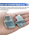 Hand holding 2 Piece Stretch Belt Tool Kit For Serpentine And Timing Belts, Metal Belt Remover And Pulley Installer Set