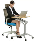 Hassle Free Pneumatic Sit Stand Laptop Desk Cart With Smooth Lever Adjustments Solid Rolling Ergonomic Mobile Workstation And No Fuss Stability For Home Office Study, adjustable height with user sitting.