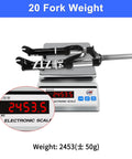 Folding Bike Front Suspension Fork With 80mm Travel, 100mm Hub Spacing, 9mm QR, Crown Lockout on electronic scale showing 2453g