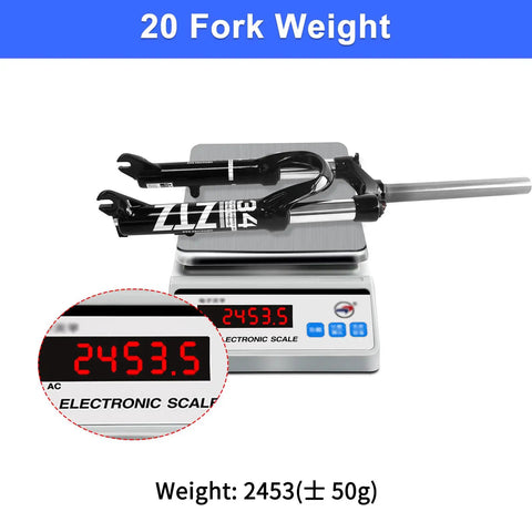 Folding Bike Front Suspension Fork With 80mm Travel, 100mm Hub Spacing, 9mm QR, Crown Lockout on electronic scale showing 2453g