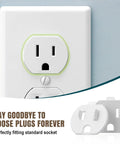 12 Pack Loose Outlet Fix With Plug Tightener Inserts on a standard socket, showcasing a snug fit to prevent loose plugs.