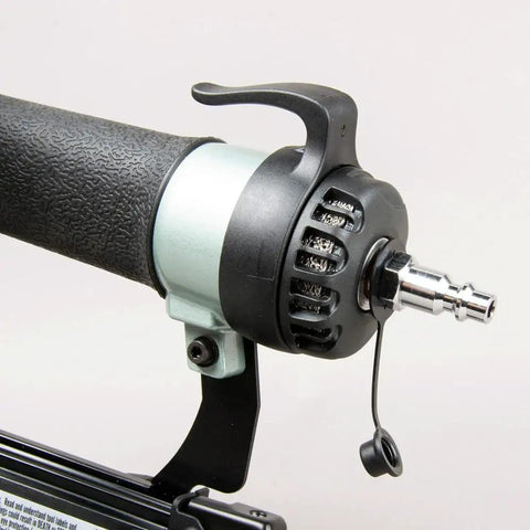 Close-up of pneumatic connector on 23 Gauge Pin Nailer Kit For Fine Trim And Molding Pneumatic Nailer With Built In Silencer Depth Adjustable For Half To Two Inch Pins Includes Safety Glasses Case And Oil NP50A